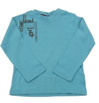 Modré triko s mrakodrapy a nápisem Mexx