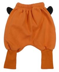 Oranžové baggy tepláky 