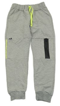 Světlešedé tepláky se zipem