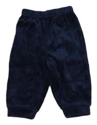 Tmavomodré sametové tepláky zn. C&A