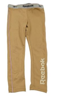 Světlehnědé sportovní legíny s logy a pruhem Reebok