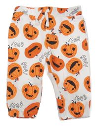 Bílo-oranžové tepláky s dýněmi Primark