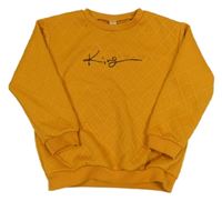 Okrová vzorovaná mikina s nápisem 