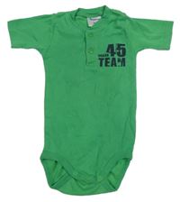 Zelené body s nápisem Impidmpi