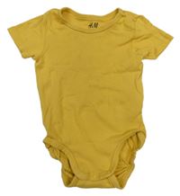Hořčicové body H&M