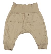 Světlehnědé tepláky s houbami H&M