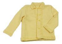 Žlutý propínací svetr s límečkem 