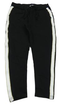 Černo-bílo-zlaté teplákové kalhoty s pruhy Name it