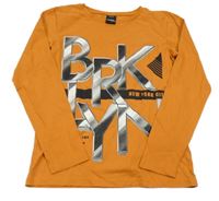 Oranžové triko s nápisem Chapter Young