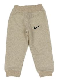 Světlebéžové melírované tepláky s logem Nike