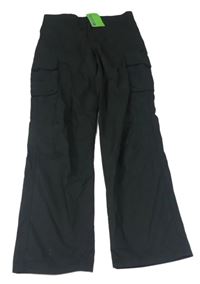 Černé šusťákové outdoorové kalhoty s kapsami zn. Mountain Warehouse