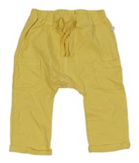 Žluté bavlněné baggy tepláky s kapsami 