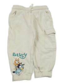 Světlebéžové tepláky s Bluey a kapsou