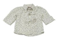 Bílá vzorovaná halenka s volánky 