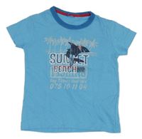 Modré tričko se žralokem a palmami