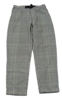 Černo-bílé kostičkované kalhoty s mašlí H&M