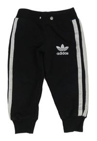 Černé tepláky s pruhy a logem - Adidas 