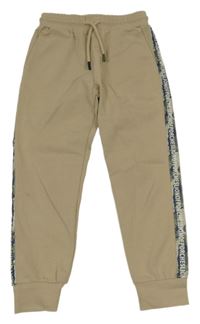 Béžové cuff tepláky s pruhem s nápisy 