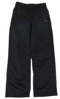 Černé sportovní funkční tepláky Decathlon