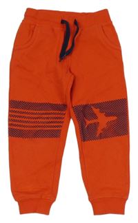 Červeno-tmavomodré tepláky s letadlem Topolino