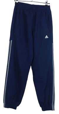 Dámské tmavomodré šusťákové kalhoty s pruhy Adidas