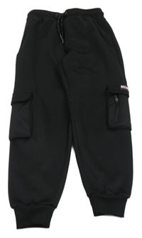 Černé sportovní tepláky s kapsami McKenzie