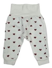 Smetanové tepláky se srdíčky H&M