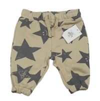 Nové- Béžové tepláky s hvězdamiPrimark