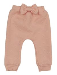 Světlerůžové srdíčkované tepláky s mašlí 