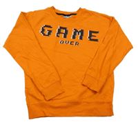 Oranžová mikina s nápisem Destination 