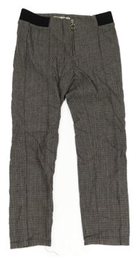 Černo-bílo-mahagonové kostkované tregínové kalhoty se zipem Zara