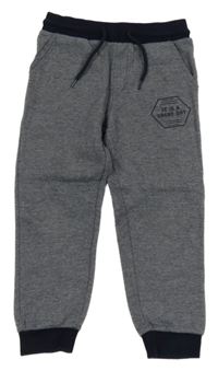 Tmavomodré melírované tepláky s nápisem Topolino