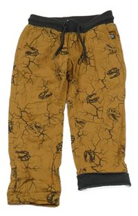 Hnědé vzorované plátěné podšité kalhoty s lebkami dinosaurů a úpletovým pasem Dopodopo