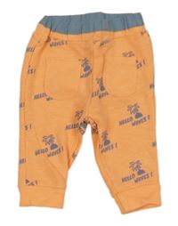 Neonově oranžové tepláky s palmami a nápisy 