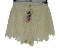 Nové - Dámské smetanové krajkové kraťasy s flitry River Island 