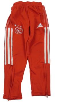 Červené sportovní funkční tepláky s pruhy Adidas 