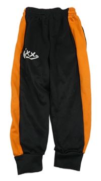 Černo-oranžové sportovní tepláky se smajlíkem 