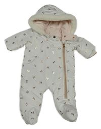 Bílá šusťáková zimní kombinéza s mašličkami a kapucí Matalan