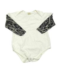 Bílé body s tylovými rukávy s kostmi