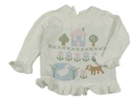 Bílý svetr s domkem a zvířaty