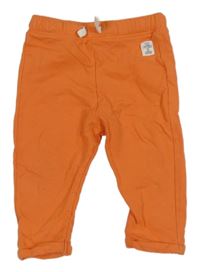 Oranžové tepláky s nášivkou M&S