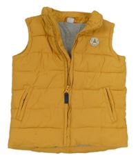 Žlutá šusťáková zateplená vesta s nášivkou 