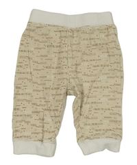 Béžovo-bílé pruhované tepláky s nápisy Ergee