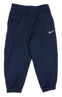 Tmavomodré sportovní tepláky s logem Nike