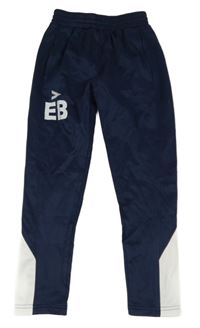 Tmavomodro-bílé sportovní kalhoty s logem Mitre