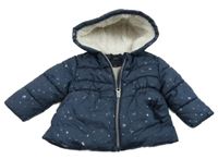 Tmavomodrá prošívaná šusťáková zimní bunda s hvězdičkami a mašlí a kapucí name it.
