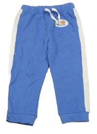 Modré tepláky s nášivkou a bílým pruhem M&S