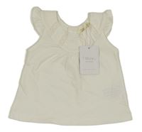 Nové - Smetanový puntíkatý top s krajkou Sfera 