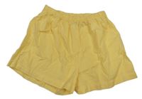 Žluté krepové volné kraťasy H&M