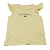 Světležluté tričko s nápisem a sluníčkem a volánky H&M